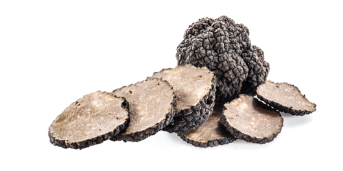 Trufa de verano con interior marrón claro y aroma suave.